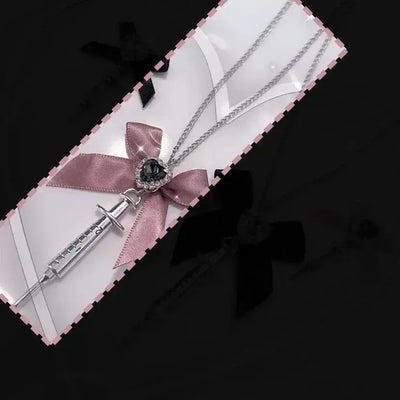 2024 New Love Heart Bowknot Metal Syringe Pendant Necklace for Women Dark Lolita Cool Trend Jewelry Gothic Fashion Accessories